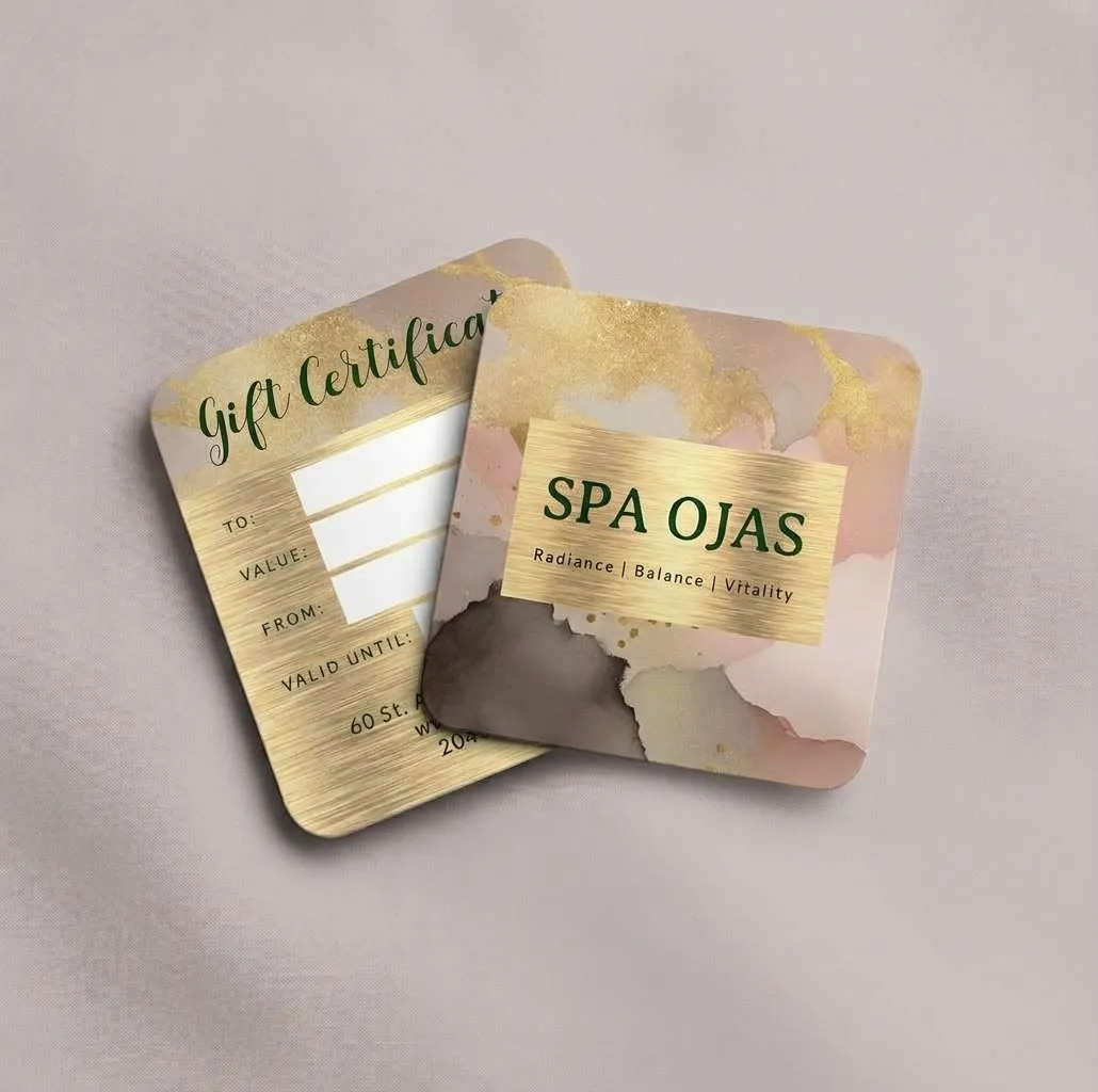 A SPA OJAS gift card and gift certificate, gold with a watercolour pattern and the words Radiance, Balance, Vitality